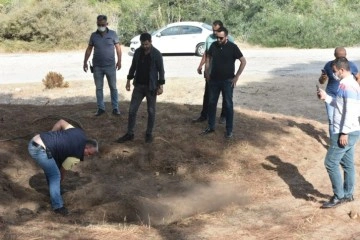 Antalya'da mezar şeklindeki tümsek polisi alarma geçirdi